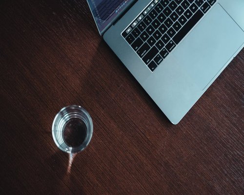 A glass of water on a working desk